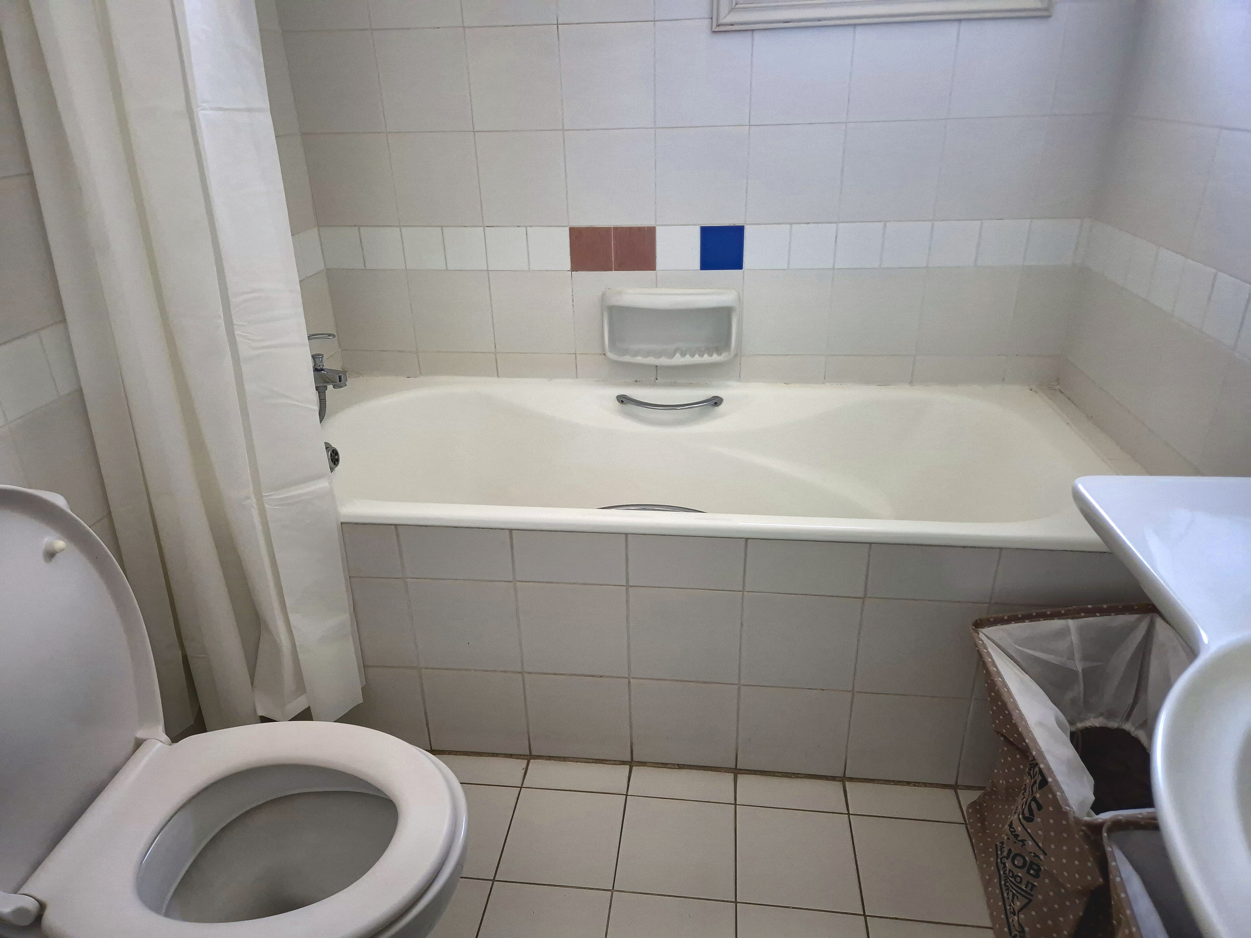 Bathroom, bath and window