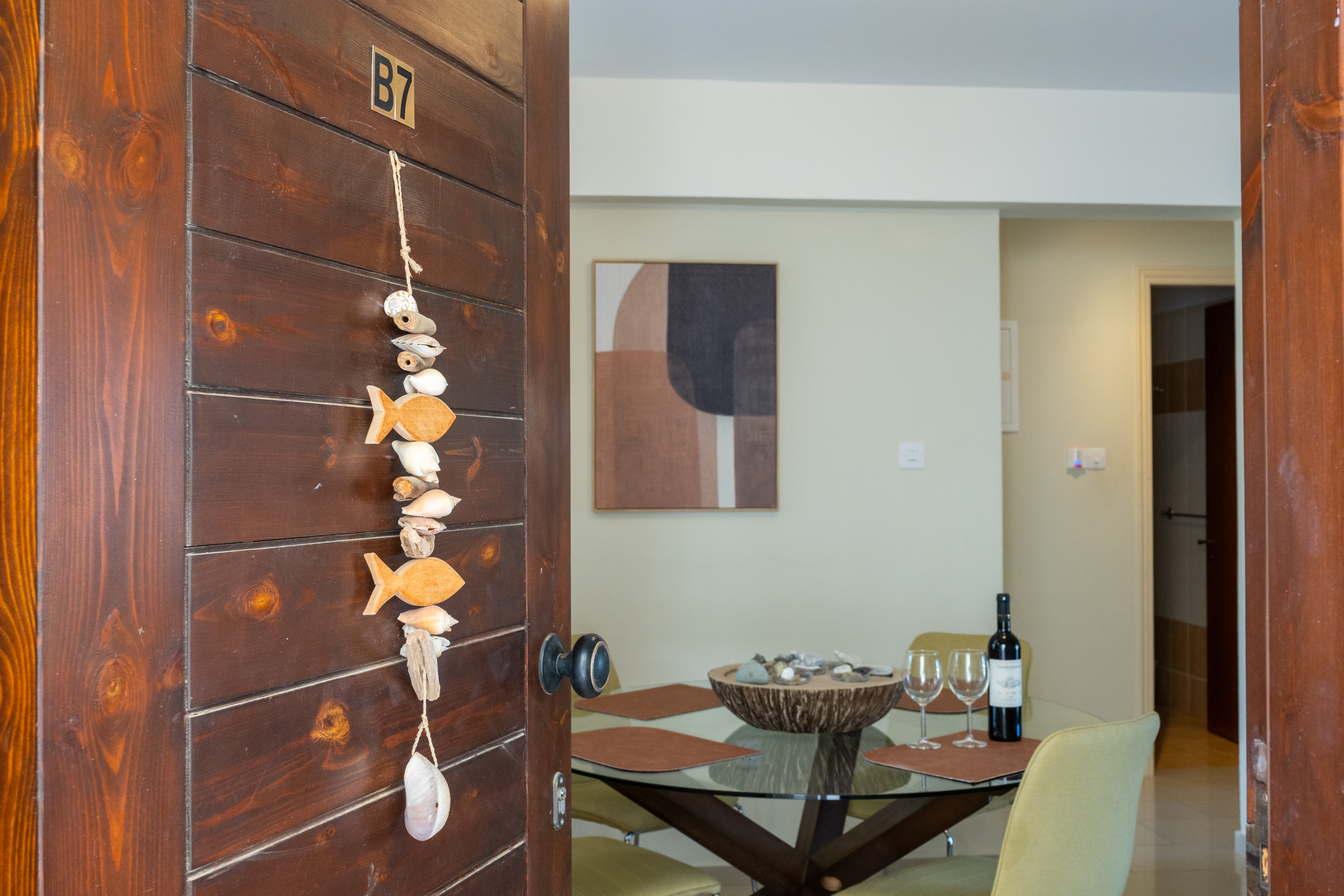 Cozy dining nook with coastal accents and a wine-ready welcome