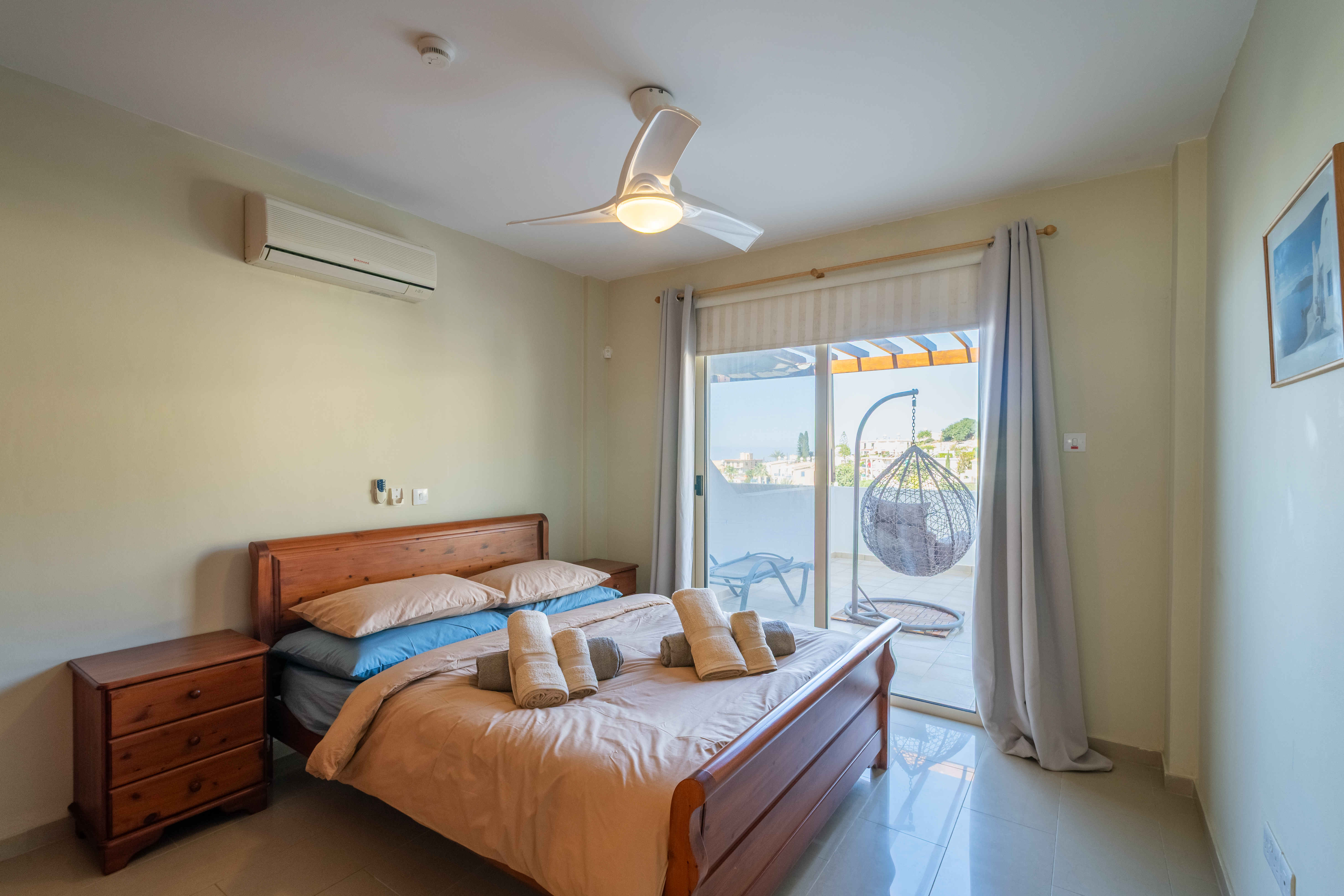Sunny bedroom with terrace, egg chair & loungers, AC + ceiling fan